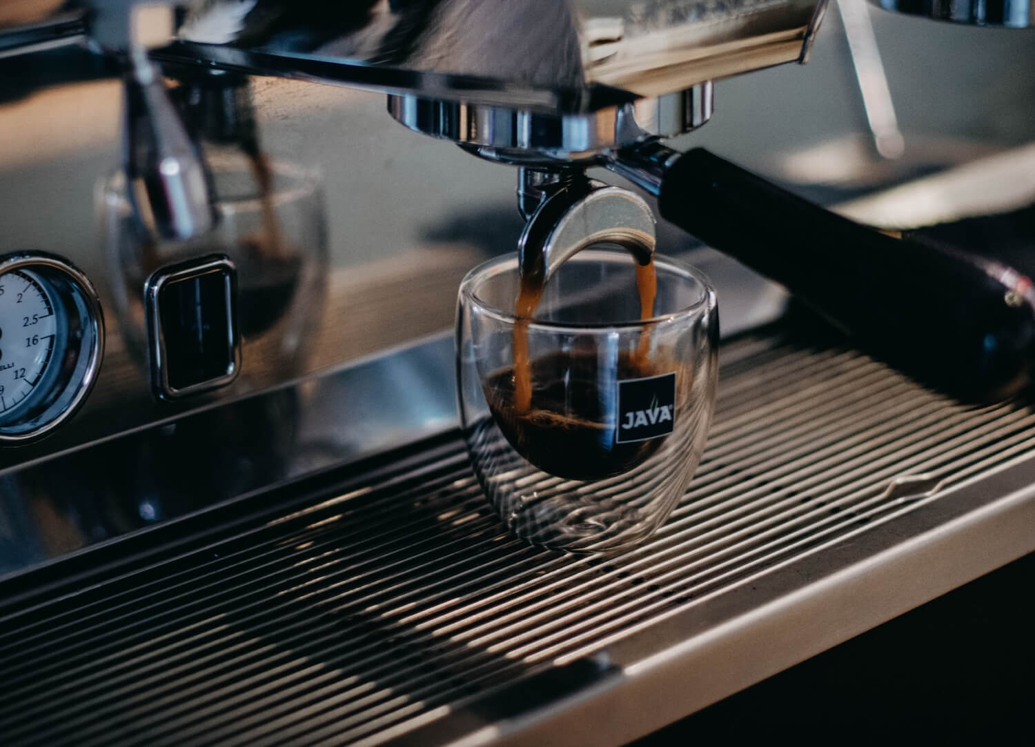 Coffee machine pouring coffee